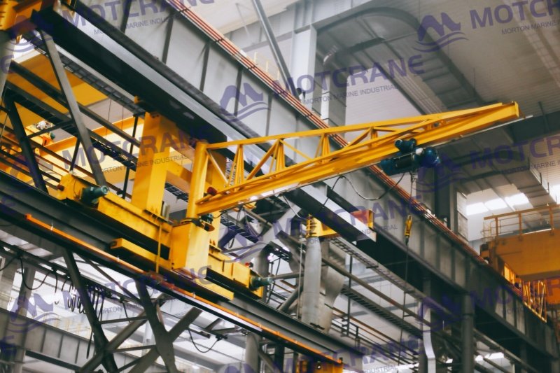 wall mounted jib crane installed in workshop maintenance area