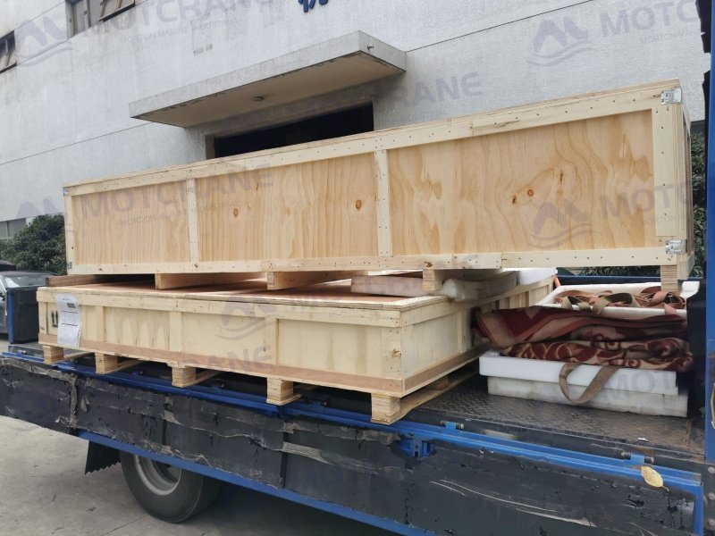 Portable aluminum gantry crane disassembled for transport between job sites